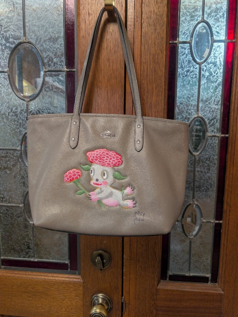 limited-edition Coach Zip Tote with embroidered Lou